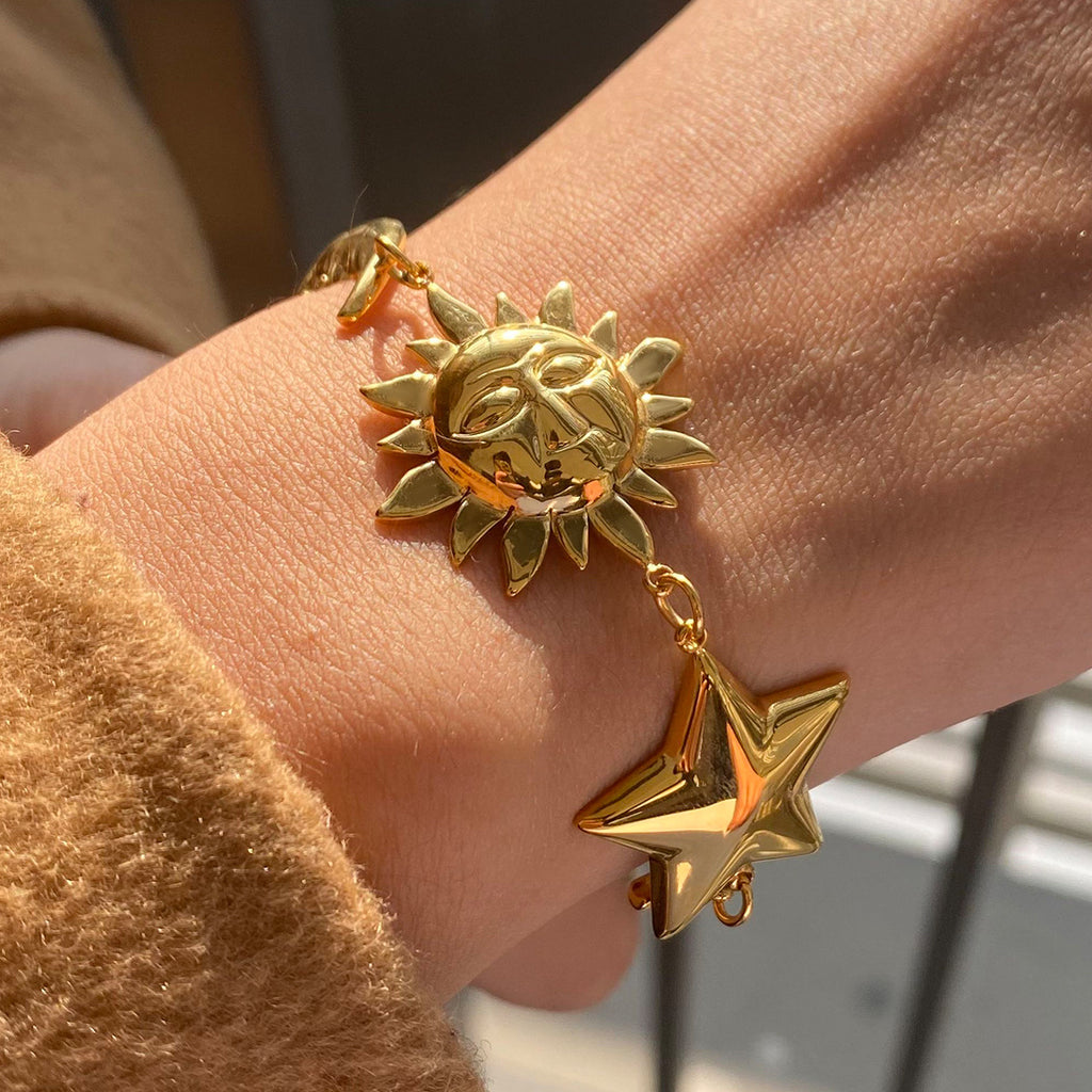 Damen elegante und hypoallergene Armbanduhr mit Mond- und Sternmotiven Shop Nory