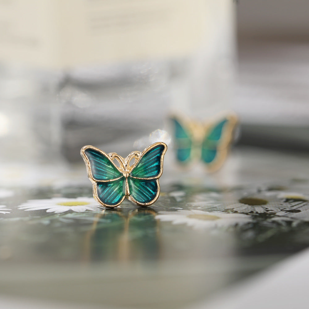 Damen Ohrringe mit floralem Schmetterlingsdesign Shop Nory