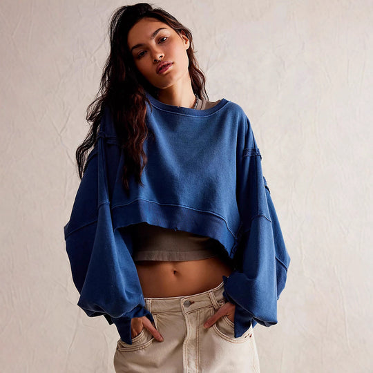 Damen cropped Oversize-Sweatshirt mit Daumenloch, fransigem Saum und weitem Raglanärmel Shop Nory
