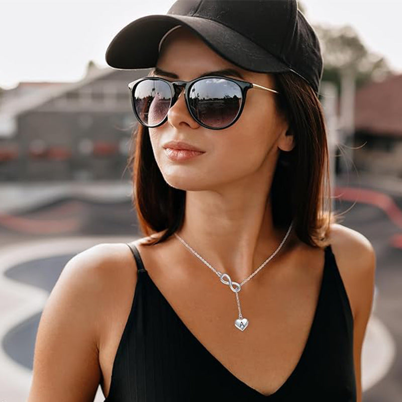 Damen Halskette mit unendlichem Symbol und personalisiertem Herzanhänger Shop Nory