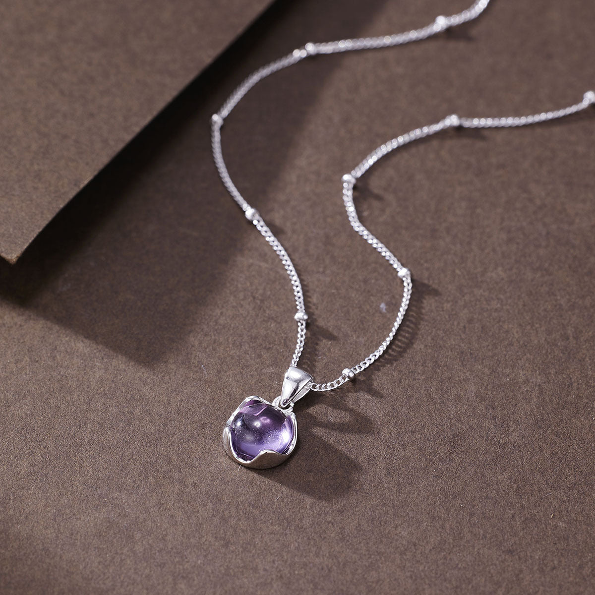 Damen Halskette mit elegantem Anhänger aus hochwertigem Amethyst und feiner Gliederkette Shop Nory