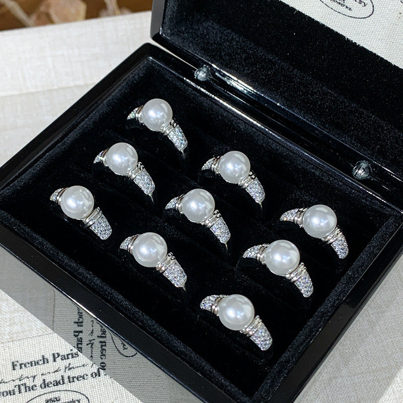 Damen Ring mit elegantem Perlen-Motiv und funkelnden Zirkonia Shop Nory