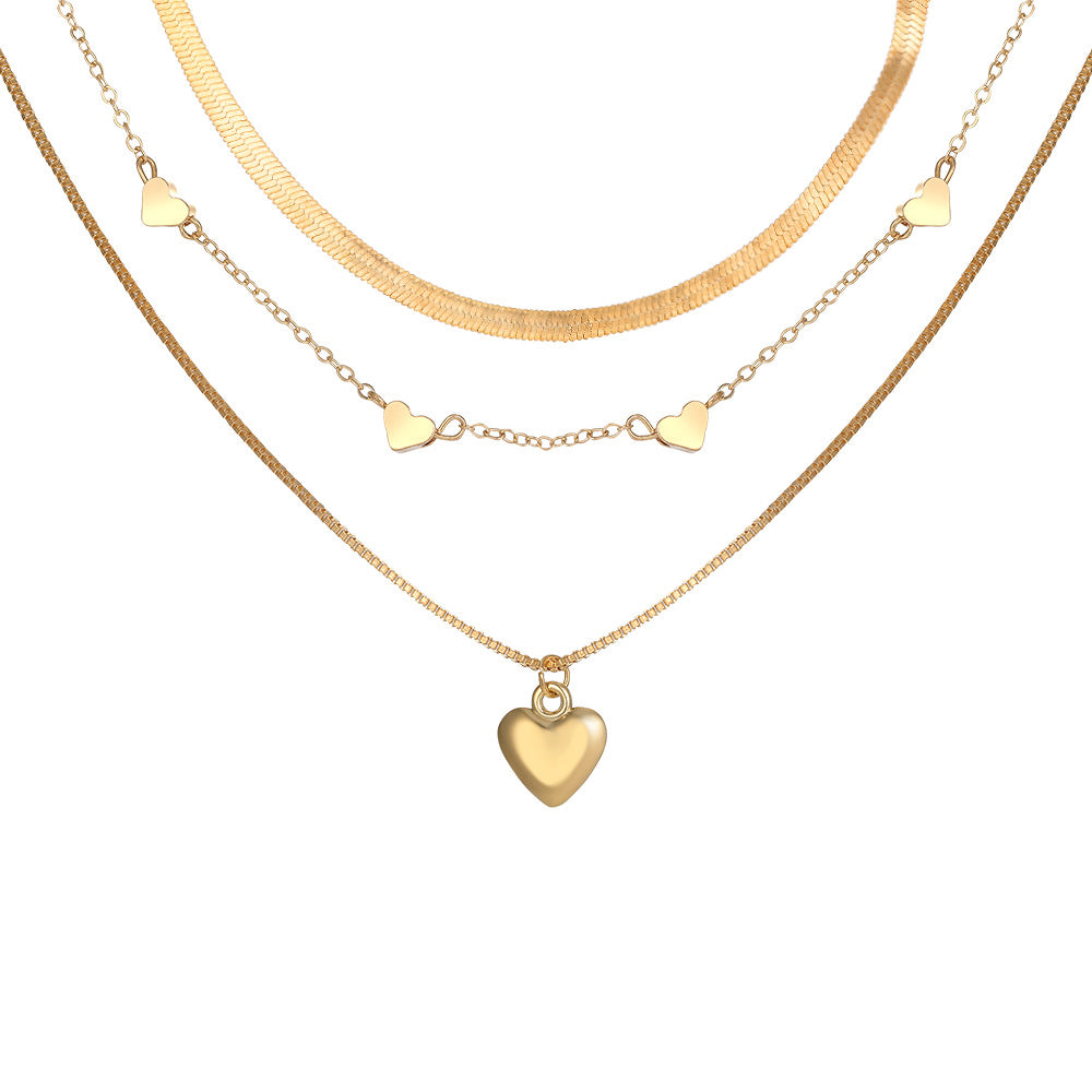 Damen Halsketten-Set mit zarten Herzanhängern und eleganten Gliederketten Shop Nory