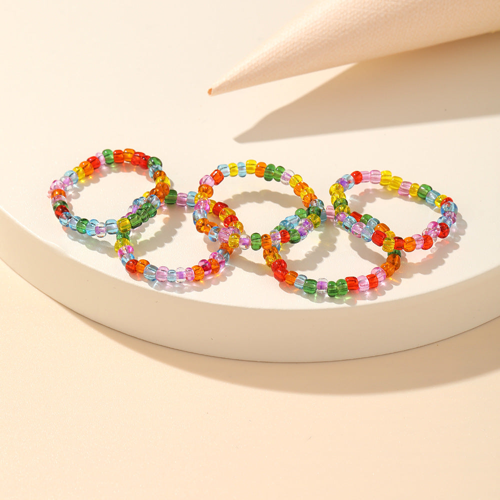 Damenarmband mit bunten und transparenten Acrylperlen Shop Nory