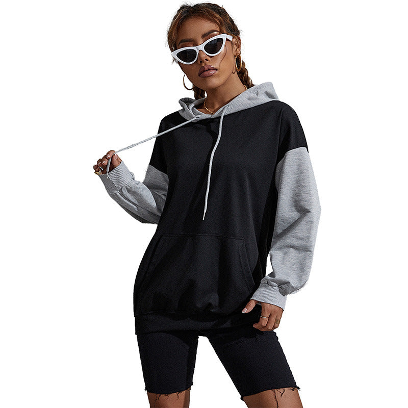 Damen Oversize Sweatshirt mit Kapuze, Kontrastärmeln und Kängurutasche Shop Nory