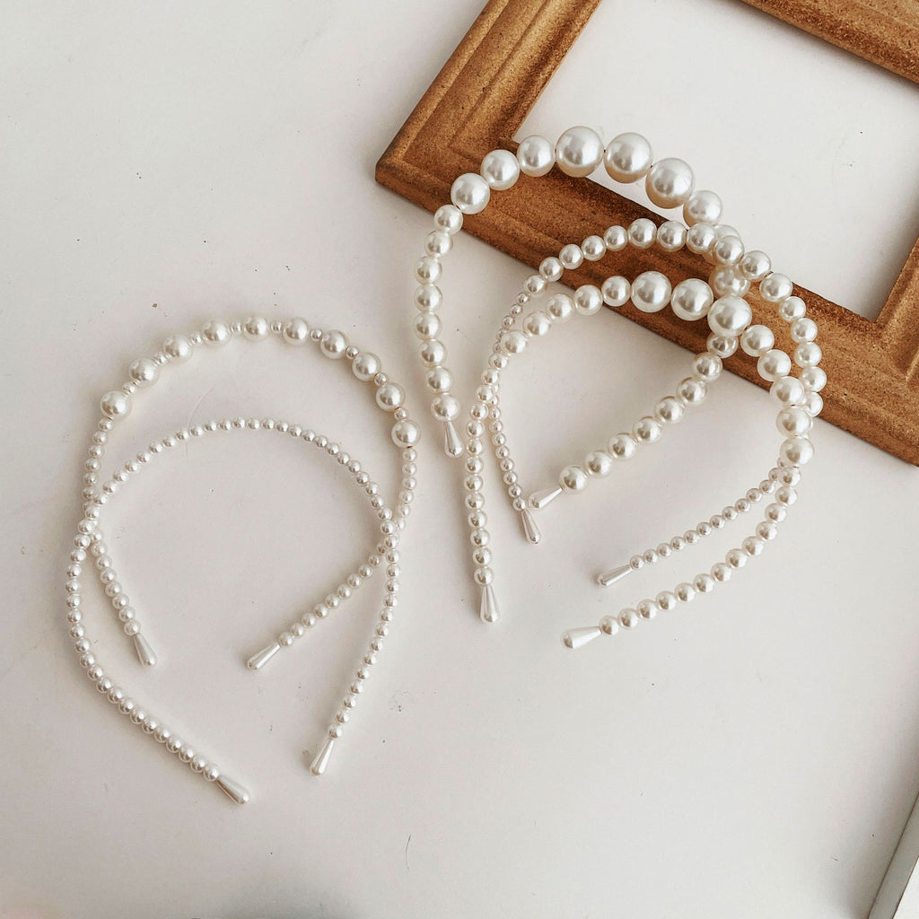 Damen Haarband mit eleganten Perlenakzenten Shop Nory