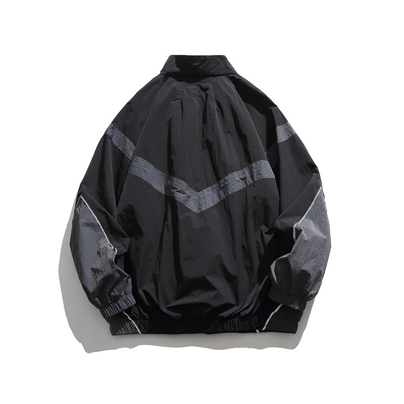 Herren Leichte Oversize Windbreaker-Jacke mit Chevron-Paneelen, Stehkragen und elastischem Saum Shop Nory