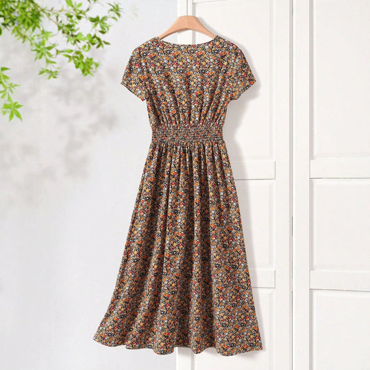 Damen Sommerliches Midikleid mit elastischem Bund und floralen Mustern