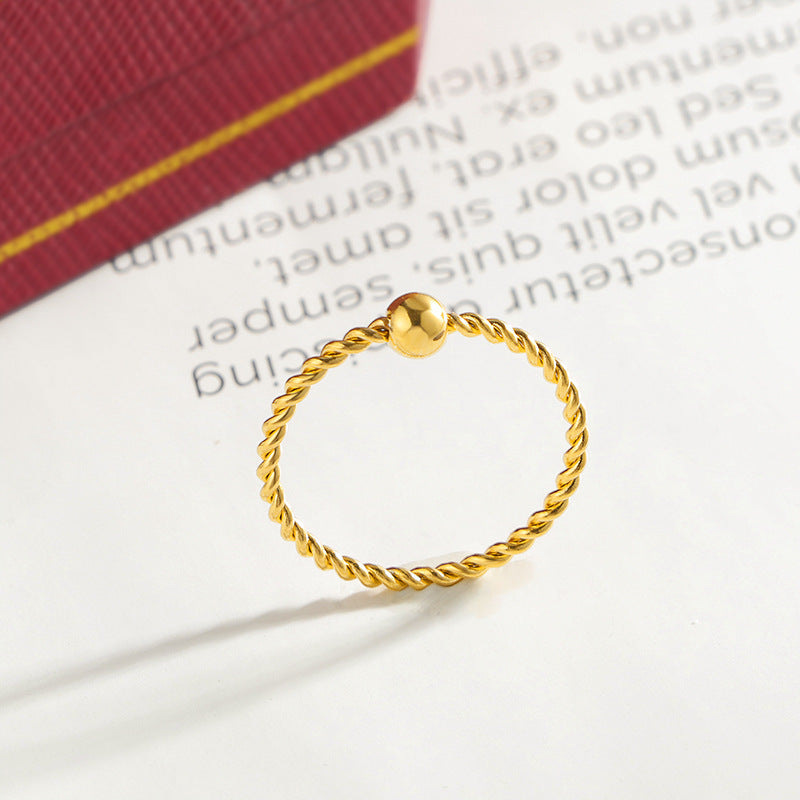 Damen feiner Ring mit verspieltem Zopfdesign und prominentem Steinelement Shop Nory