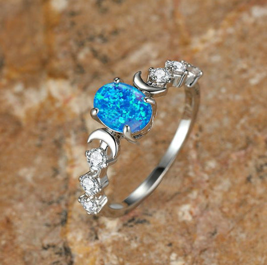 Damen Ring mit schimmerndem Opal und funkelnden Zirkonia-Steinen Shop Nory