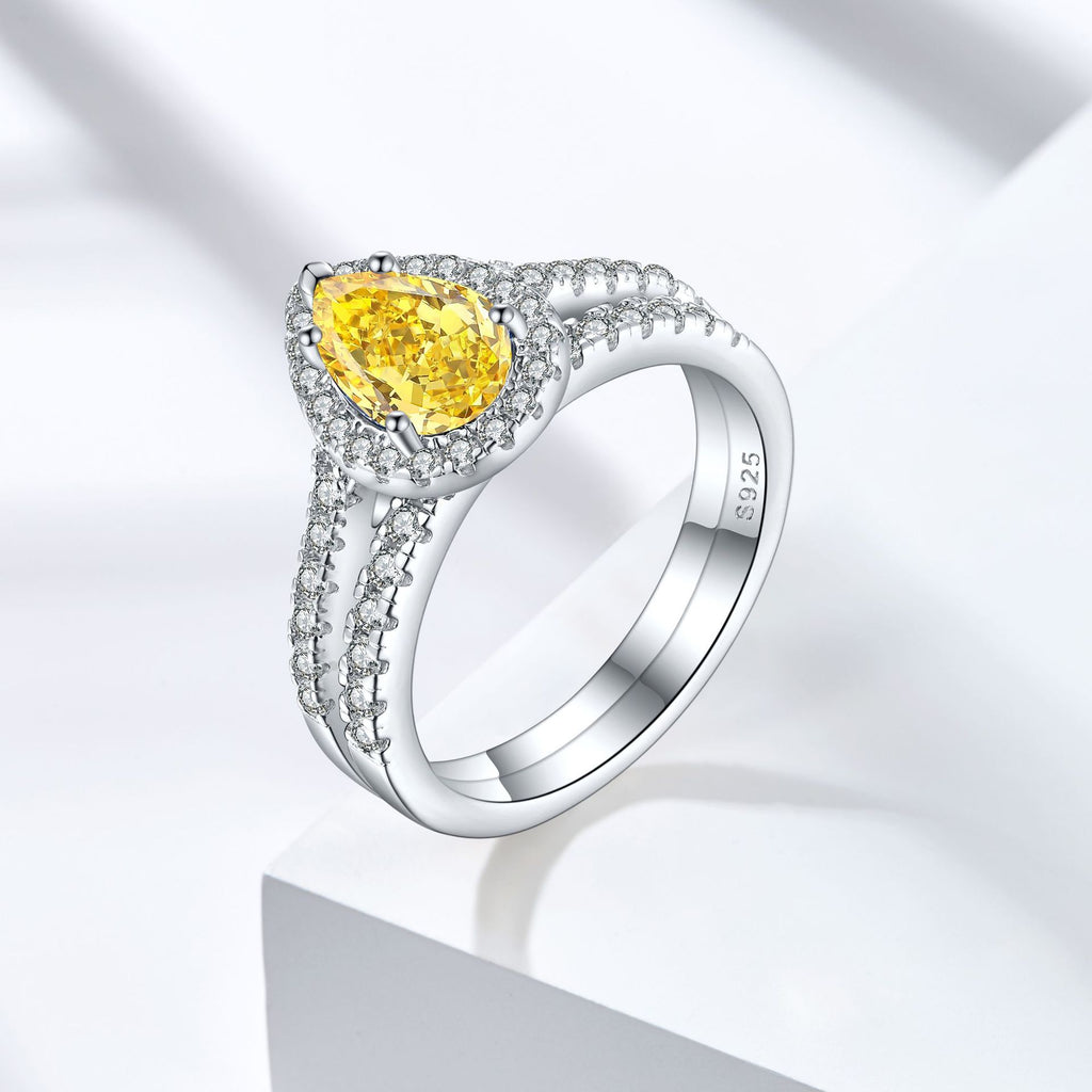 Damen eleganter Tropfenring mit funkelndem Edelstein und Zirkonia-Besatz Shop Nory