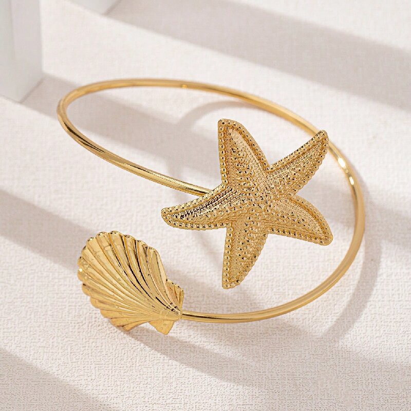Damen Offener Armreif mit maritimem Sternen- und Muschel-Design Shop Nory