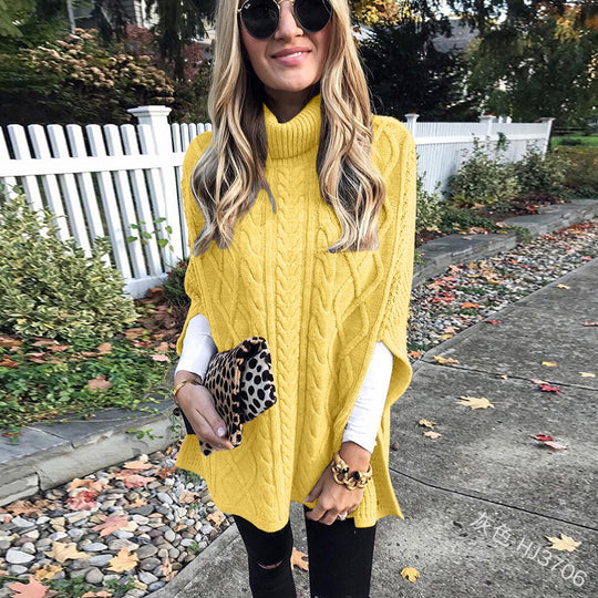 Damen nan kastiger Strickponcho mit hohem Rollkragen, Zopfstruktur und seitlichen Schlitzen Shop Nory