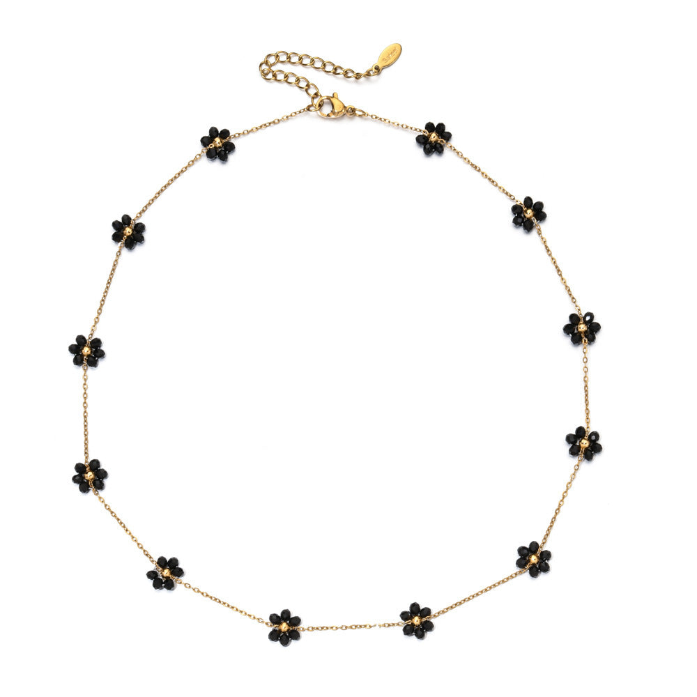 Damen zarte Halskette mit floralen Akzenten und goldfarbener Kettengestaltung Shop Nory