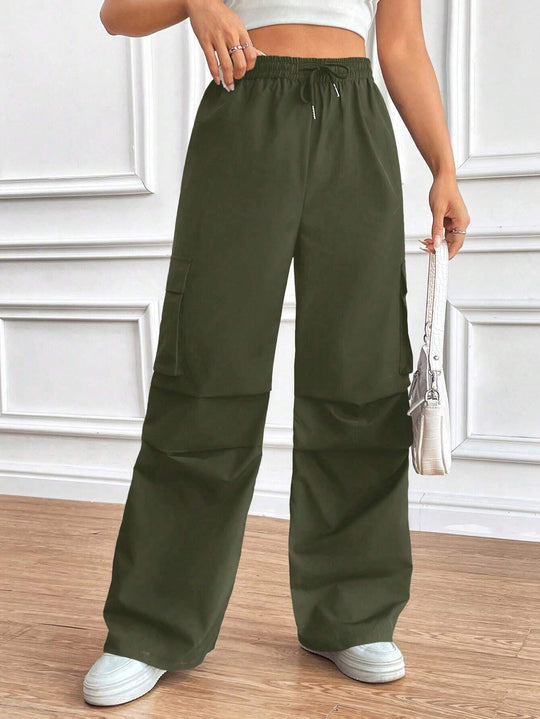 Damen Weite High‑Waist Cargo‑Hose mit Elastikbund und großen Klappentaschen Shop Nory