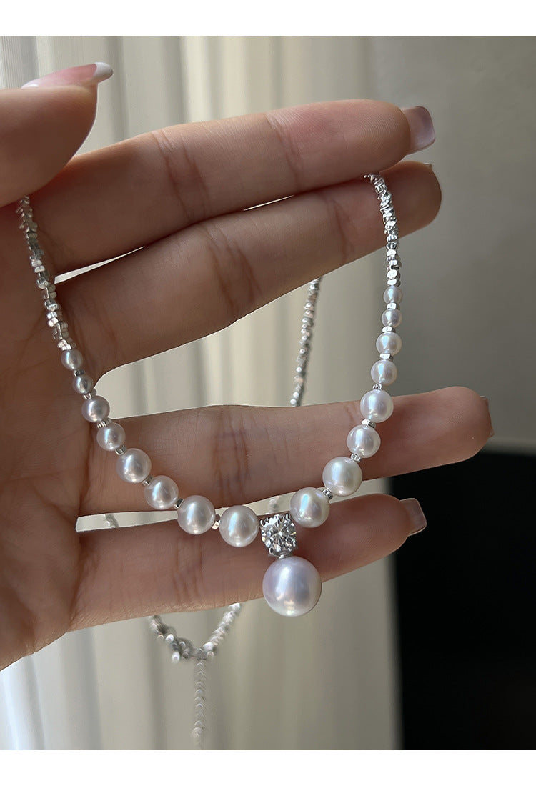 Damen Halskette mit schimmernden Perlen und funkelnden Details Shop Nory