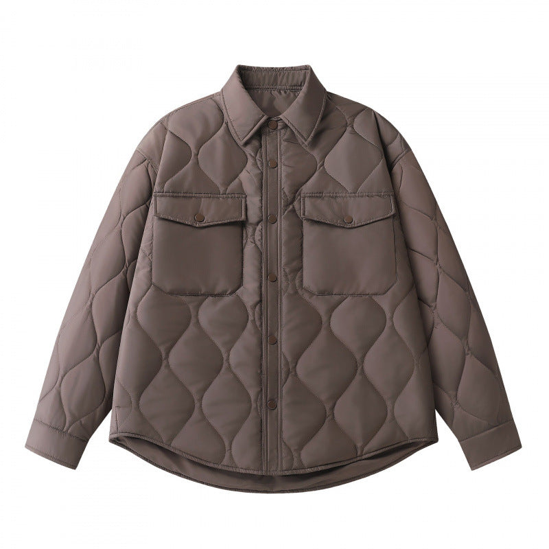 Unisex Gepolsterte gesteppte Hemdjacke mit Pattentaschen und abgerundetem Saum Shop Nory