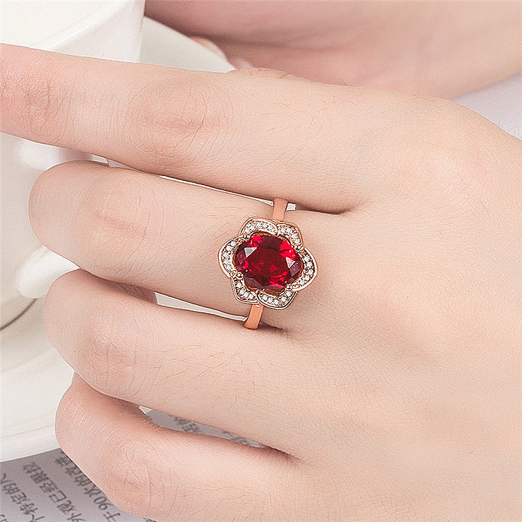 Damen Schmuckring mit floralem Design und funkelndem Hauptstein Shop Nory