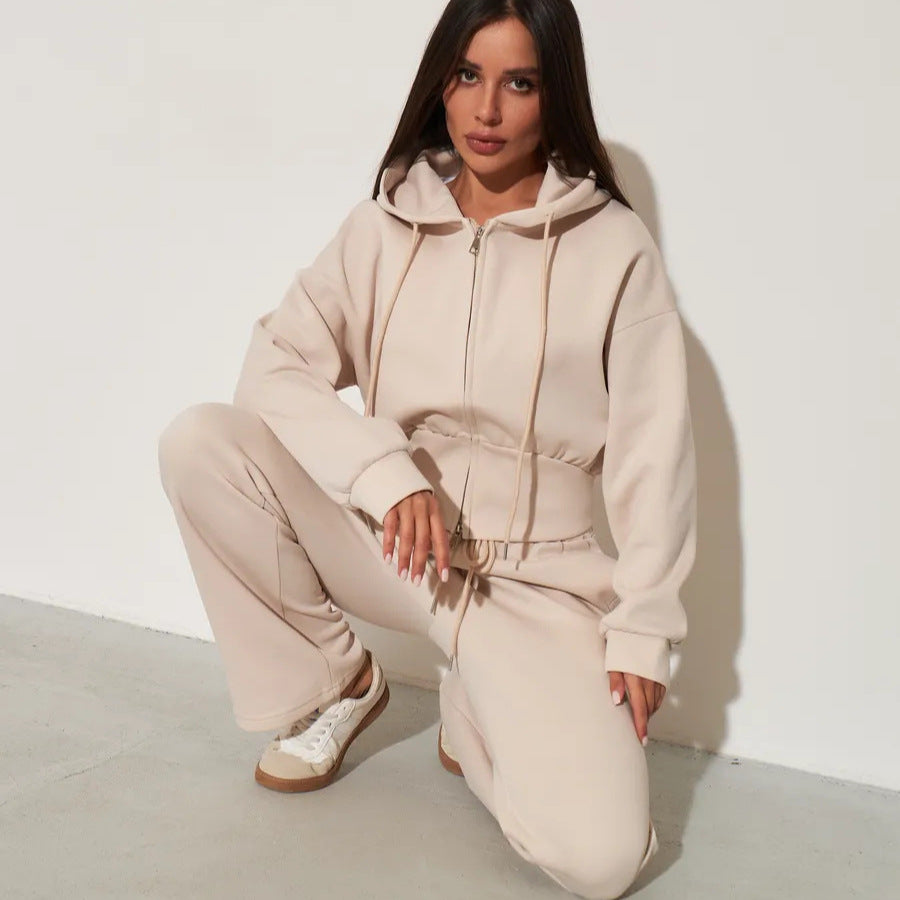 Damen kurzes Kapuzen-Zipshirt mit tailliertem Tunnelzug und weit geschnittene High-Waist-Loungehose Shop Nory
