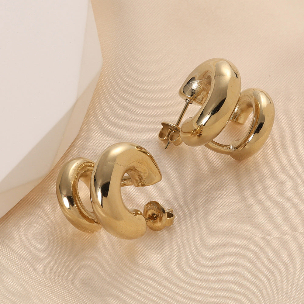 Damen Ohrstecker mit geschwungenem Design aus hochwertigem Edelstahl Shop Nory