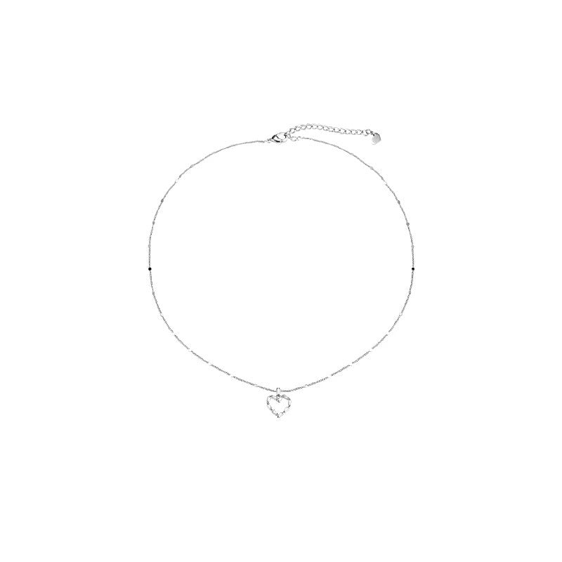 Damen Halskette mit filigranem Herzanhänger und funkelnden Zirkonia Shop Nory