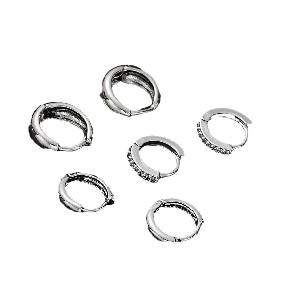 Damen Ohrringe mit funkelnden Zirkonia und geschwungenem Design Shop Nory