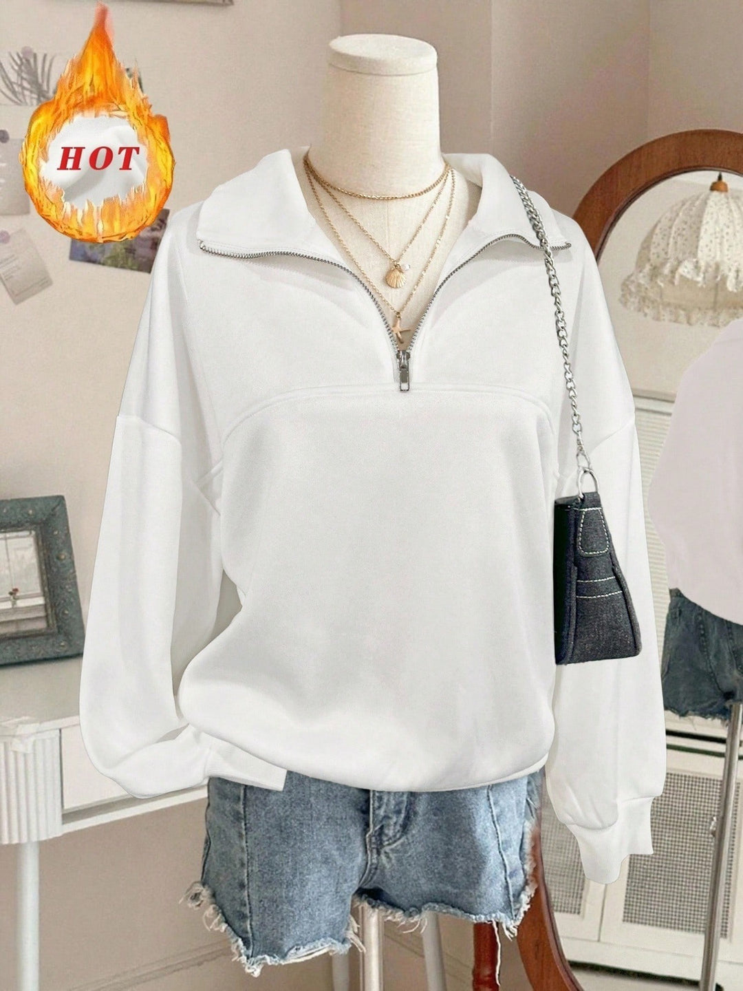 Damen nan Oversize Sweatshirt mit halbem Reißverschluss, Stehkragen und Ballonärmeln Shop Nory