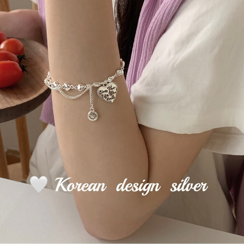 Damenarmband mit herzförmigem Anhänger aus hochwertigem Silber und verspieltem Design Shop Nory