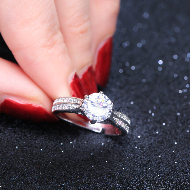 Damenring mit funkelndem Zirkonia und elegantem Band Shop Nory