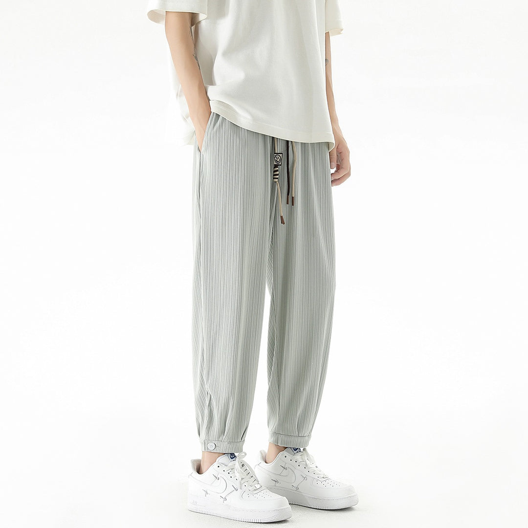 Herren Weit geschnittene Freizeithose mit Tunnelzug, feiner Rippenstruktur und geknöpften Beinbündchen Shop Nory