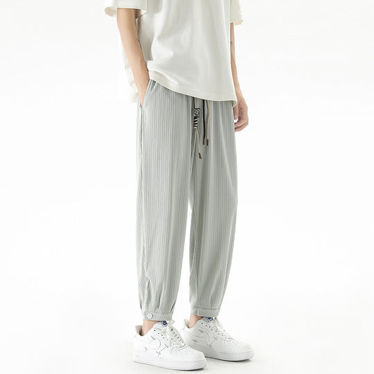Herren Weit geschnittene Freizeithose mit Tunnelzug, feiner Rippenstruktur und geknöpften Beinbündchen Shop Nory