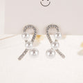 Damen Ohrringe mit elegantem Perlen- und Zirkonia-Design Shop Nory