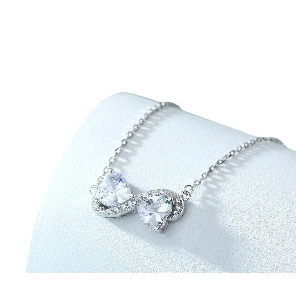 Damen herzförmiger Anhänger mit funkelnden Zirkonia und elegantem Design Shop Nory