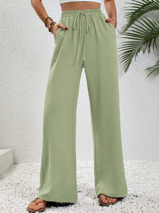 Damen Leichte, weit geschnittene Strandhose mit Elastikbund, Kordelzug und Seitentaschen Shop Nory
