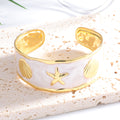 Damen Armreif mit maritimem Muschel- und Seestern-Design Shop Nory