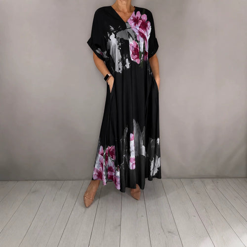 Damen Maxikleid mit weitem Fall, V-Ausschnitt, Eingrifftaschen und floraler Aquarelloptik Shop Nory