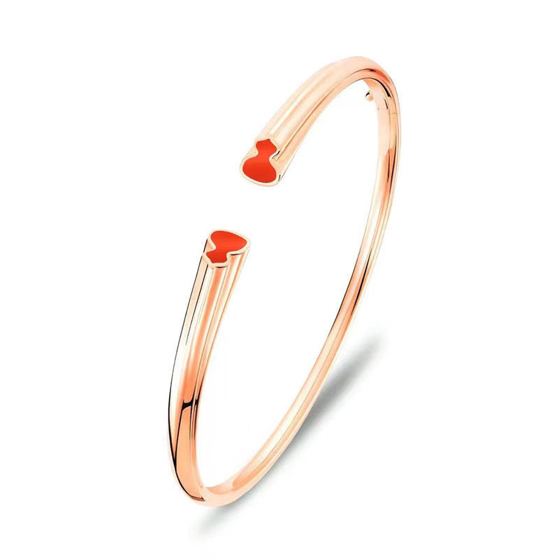 Damen Armband mit herzförmigem Anhänger und funkelnden Kristallen Shop Nory