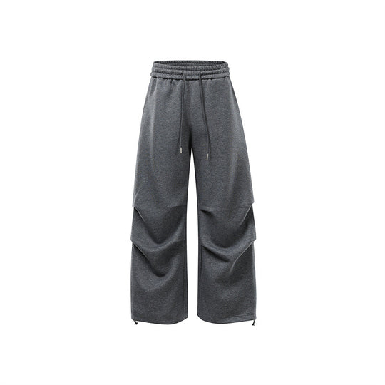 Unisex Weite Sweat-Cargohose mit Ebenenpasse, elastischem Kordelbund und verstellbarem Saum Shop Nory