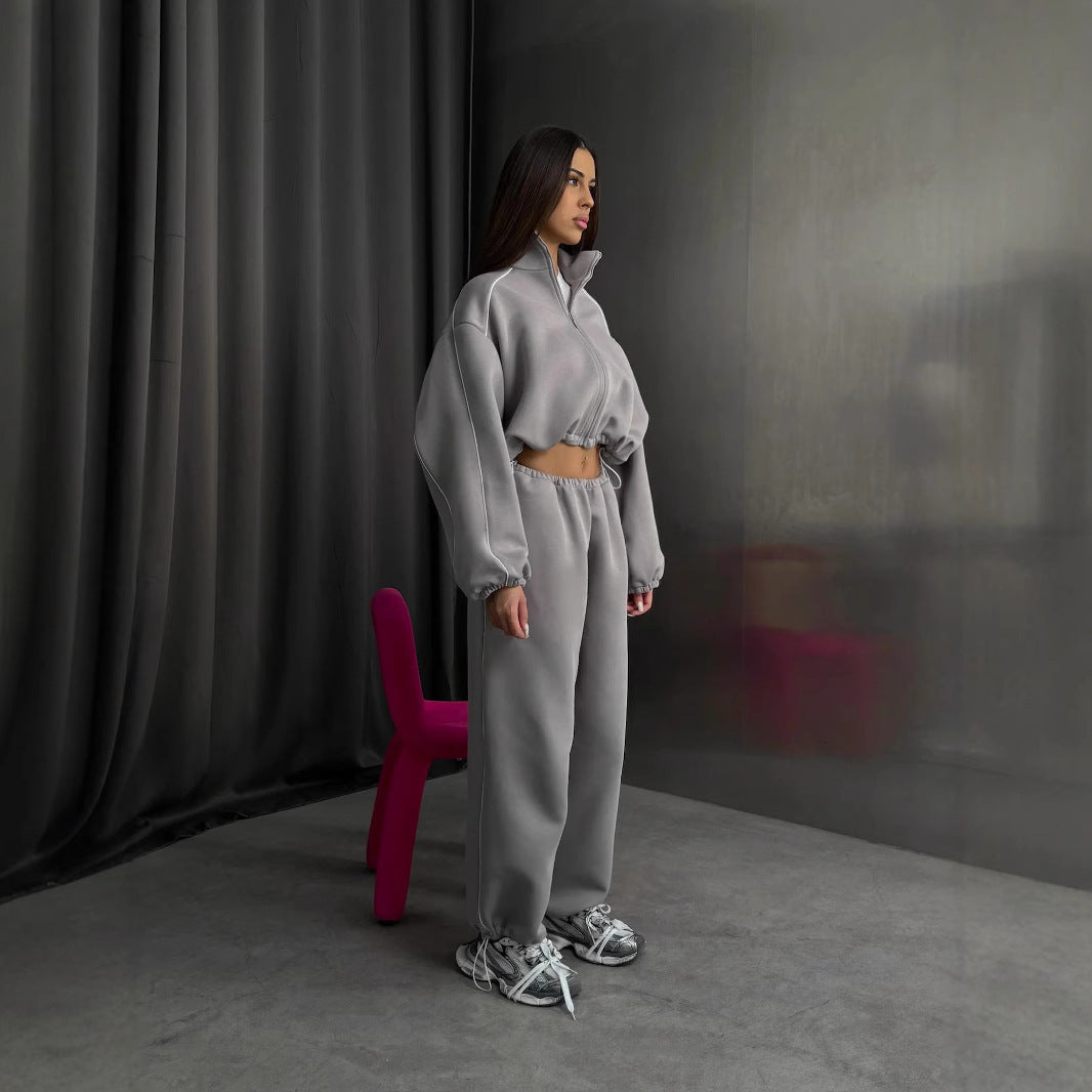 Damen cropped Zip-Kapuzenjacke mit Tunnelzug-Bund, oversized Ärmeln und kontrastierender Paspel Shop Nory