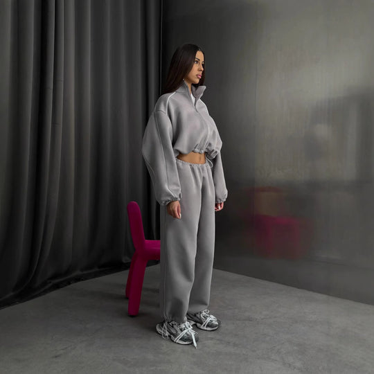 Damen cropped Zip-Kapuzenjacke mit Tunnelzug-Bund, oversized Ärmeln und kontrastierender Paspel Shop Nory