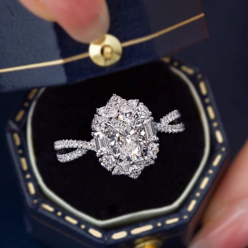 Damen Verlobungsring mit kunstvollem, floralen Design und funkelnden Zirkonia Shop Nory
