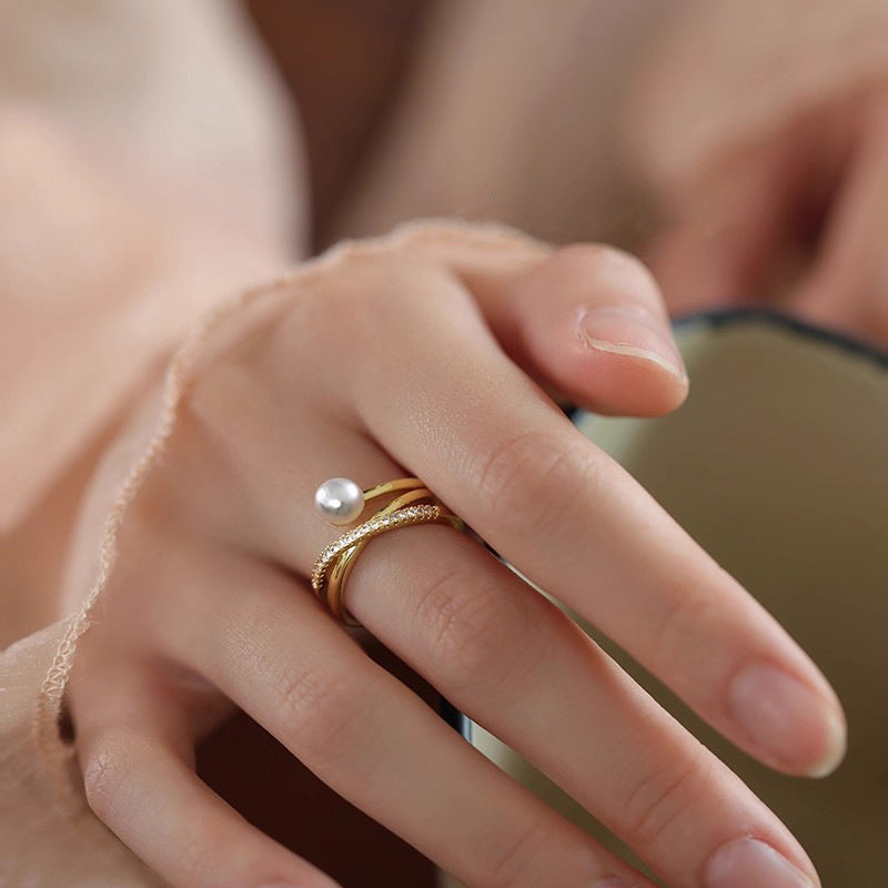 Damen Zierlicher Ring mit geschwungenem Design und Perle Shop Nory