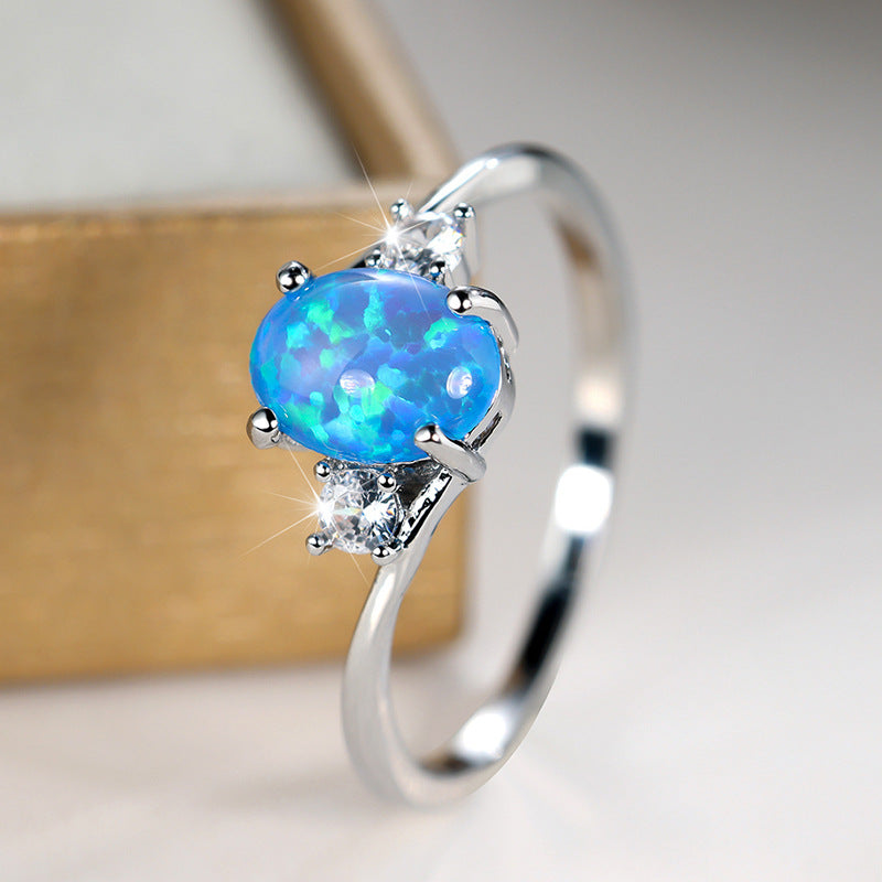 Damen Ring mit Opalstein und funkelnden Zirkonia Shop Nory