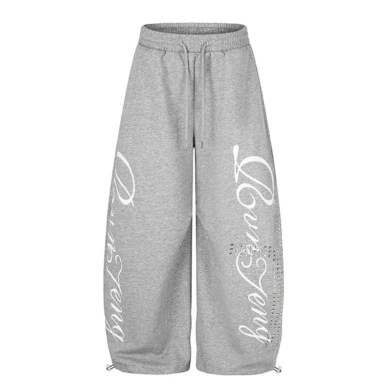 Damen Palazzo-Sweatpants im Culotte-Stil mit hohem Bund, Tunnelzug, Schriftprint und Strassbesatz Shop Nory
