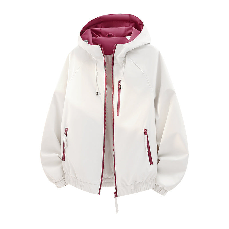 Damen Leichte Kapuzen‑Shelljacke im Urban‑Look mit kontrastfarbenem Futter, Reißverschlusstaschen und elastischem Bund Shop Nory
