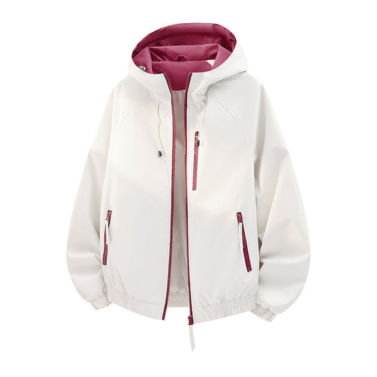 Damen Leichte Kapuzen‑Shelljacke im Urban‑Look mit kontrastfarbenem Futter, Reißverschlusstaschen und elastischem Bund Shop Nory