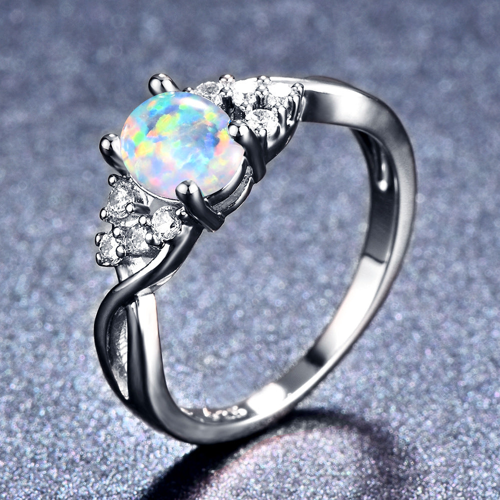 Damen Ring mit schimmerndem Opal und Zirkonia-Verzierungen Shop Nory