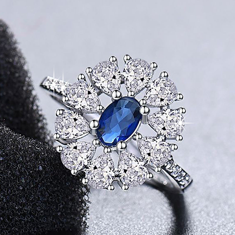 Damen eleganter Ring mit funkelndem Rubin und kunstvollem Zirkonia-Besatz Shop Nory
