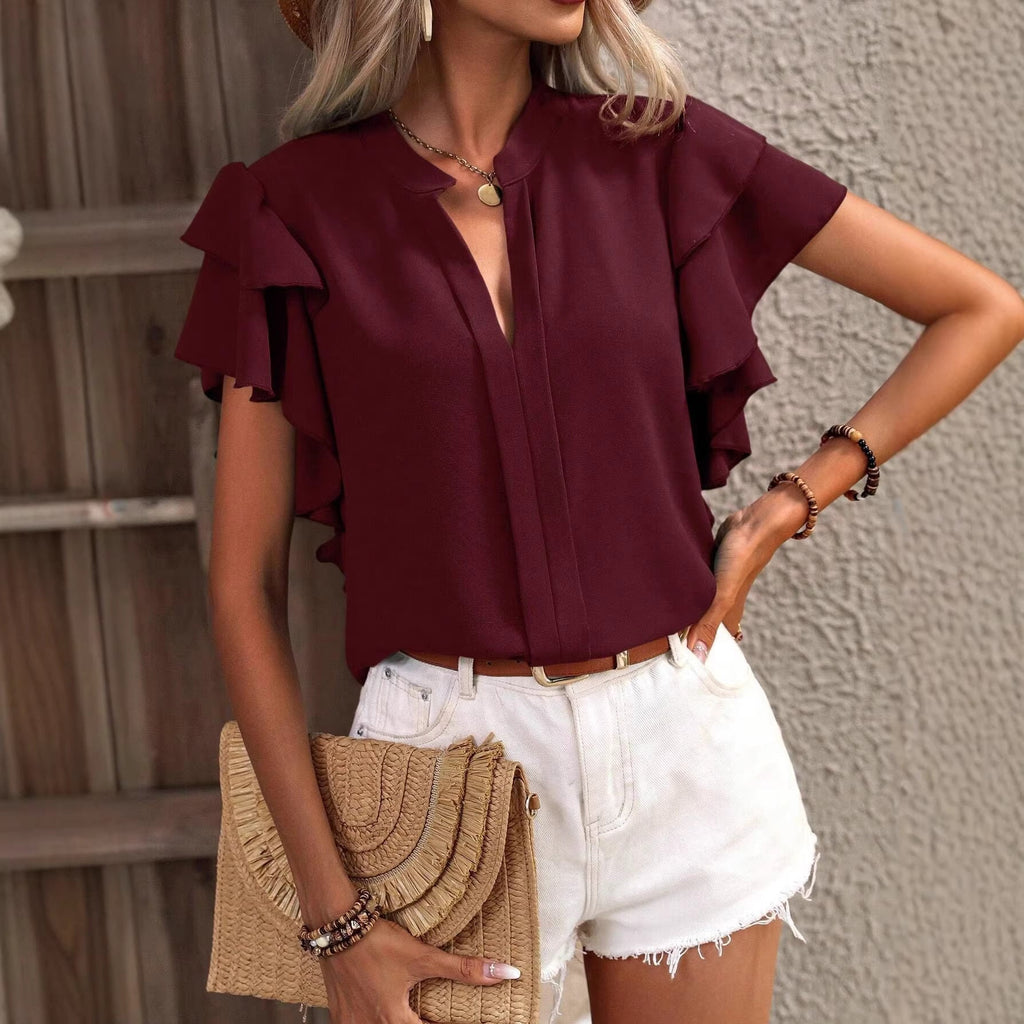 Damenbluse mit Rüschendetails und elegantem V-Ausschnitt