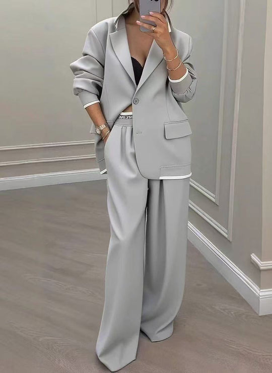 Damen Oversize-Tailoring-Set mit Kontrastpaspel, Single-Button-Blazer und hochgeschnittener Weitbeinhose Shop Nory
